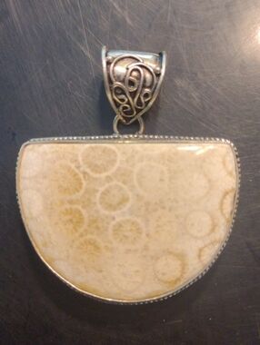 Sterling Silver Half Oval Pendant Fossil Coral Celtic Design. Good Condition